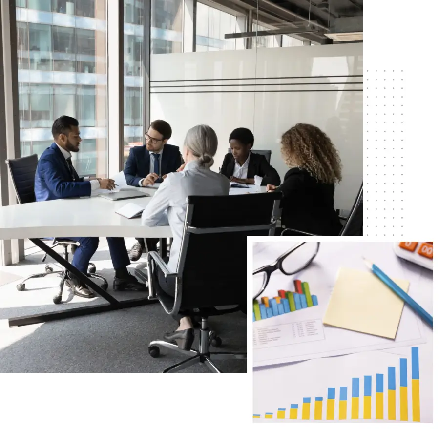 Business meeting with charts and graphs.